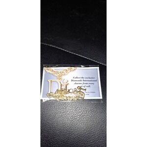 Diamonds International Di Charm Bracelet Gold Toned Chain Caribbean Vintage 7.5"